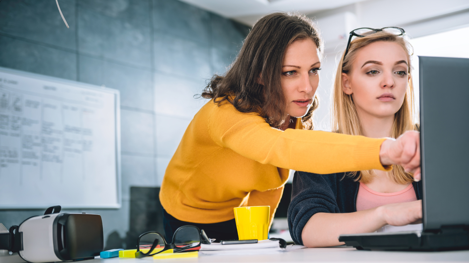 women looking at computer screen