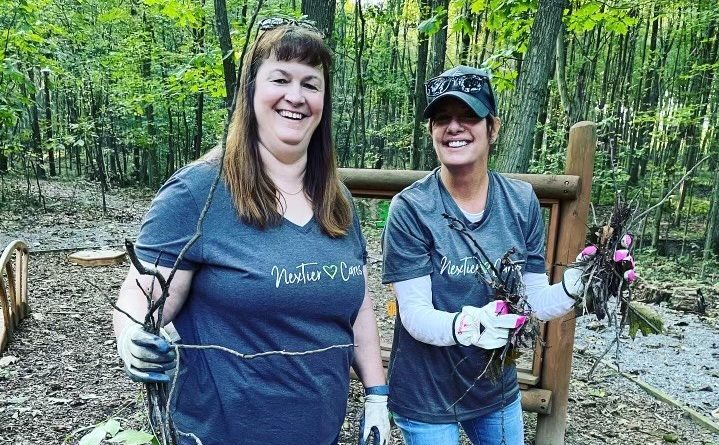 NexTier Employees cleaning up grounds during United Way Week of Caring 2021.