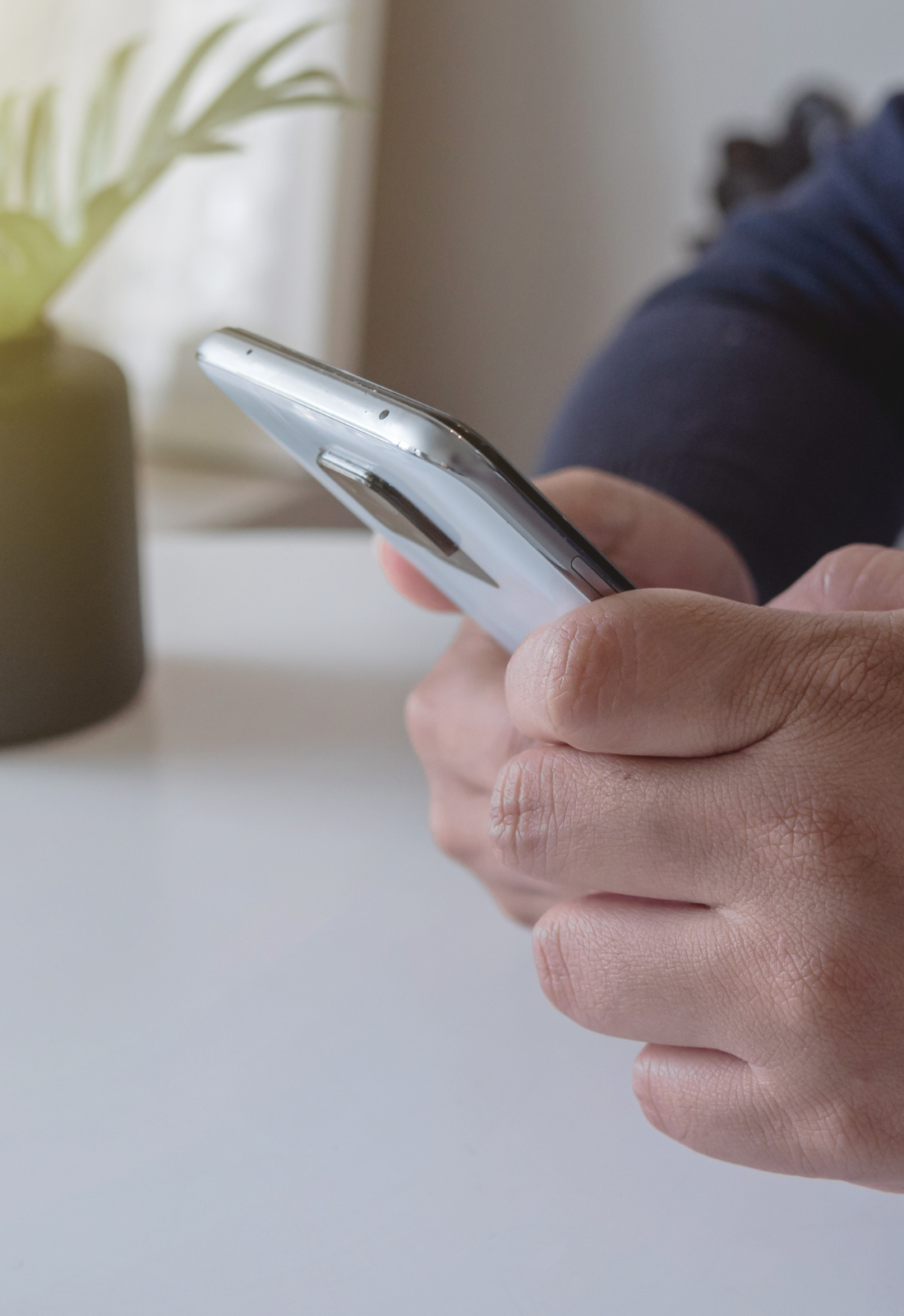 Man looking at his smartphone screen