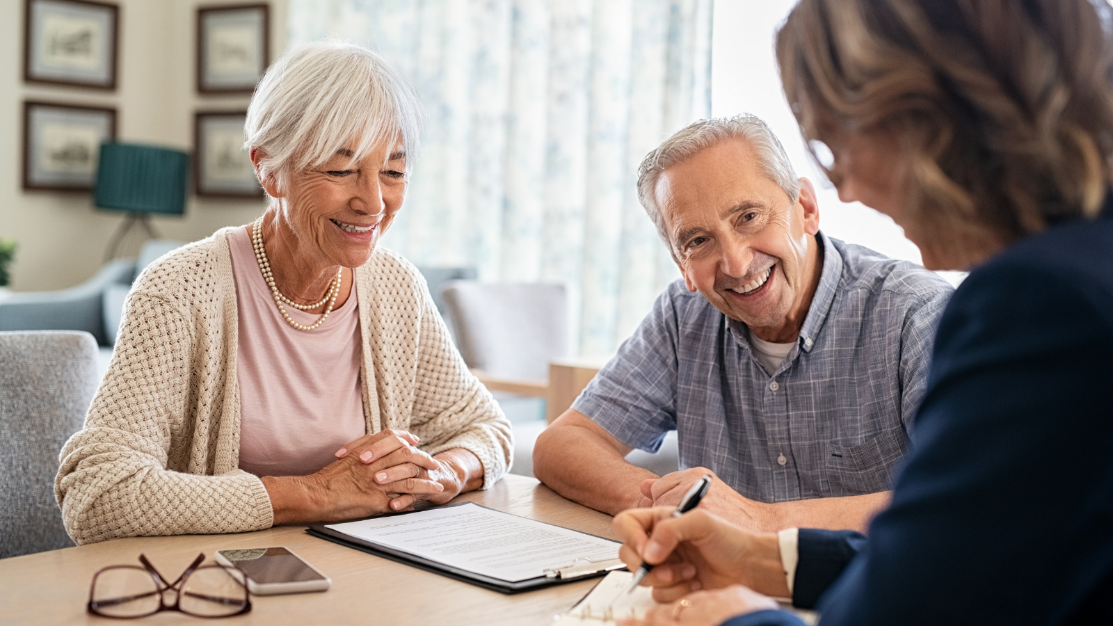 a retired veteran discussing financial options with his wife